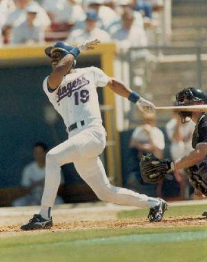 Juan Gonzalez #19 of the Texas Rangers wearing Franklin in 1991